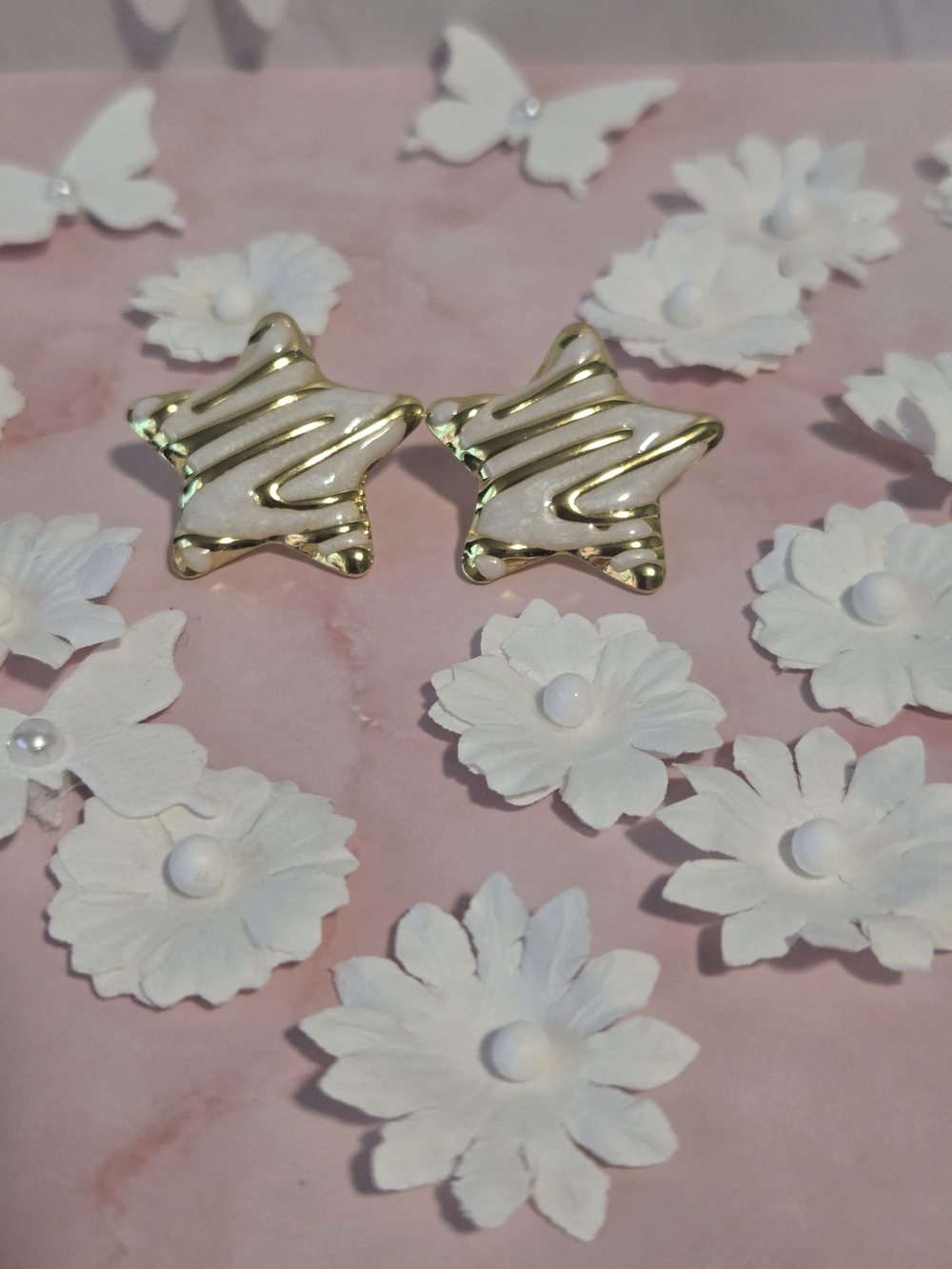 Get both pairs for only $10! and White Star Wave Stud Earrings
